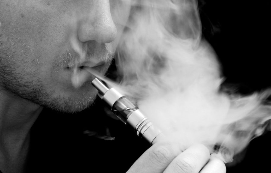 Vaping+can+certainly+do+horrible+things+to+your+body.+This+image+shows+a+man+vaping.+Let%E2%80%99s+stop+the+vaping+for+not+just+teenagers+but+adults%21%0A