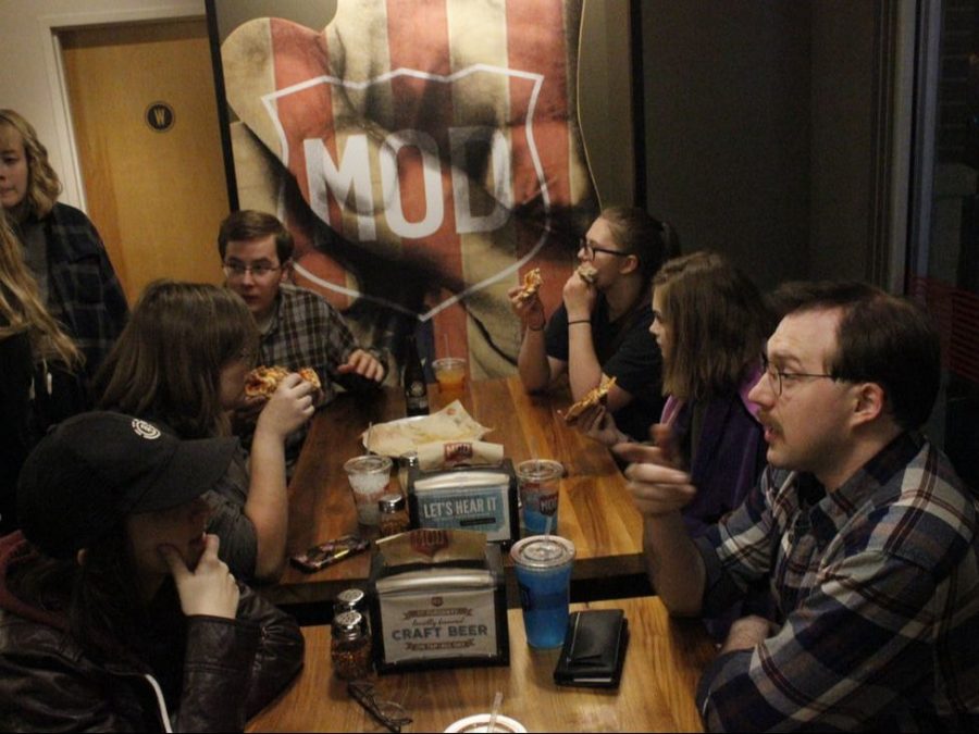 After attending a screening of an Oscar-nominated film, Film Club members Nicole Woods, Jenna Prelle, Conor McDaniel, Susan Rose, and Sam Scarberry discuss the film with club sponsor Mr. Coon at MOD Pizza.