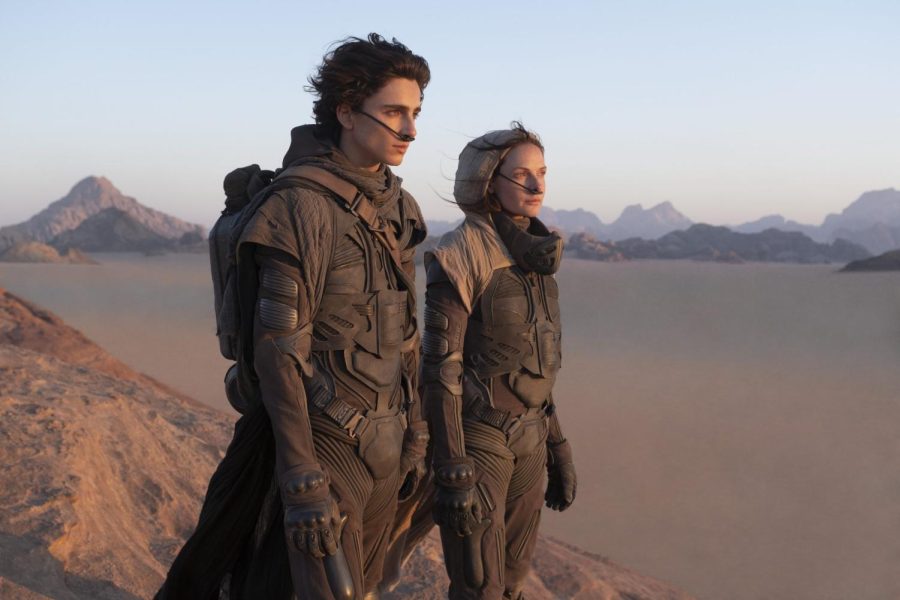 Timothee Chalamet and Rebecca Ferguson pose in character during tier shoot on set. The director chose locations that were used in other movies like Star Wars, so if you pay close attention you can see some similarities.