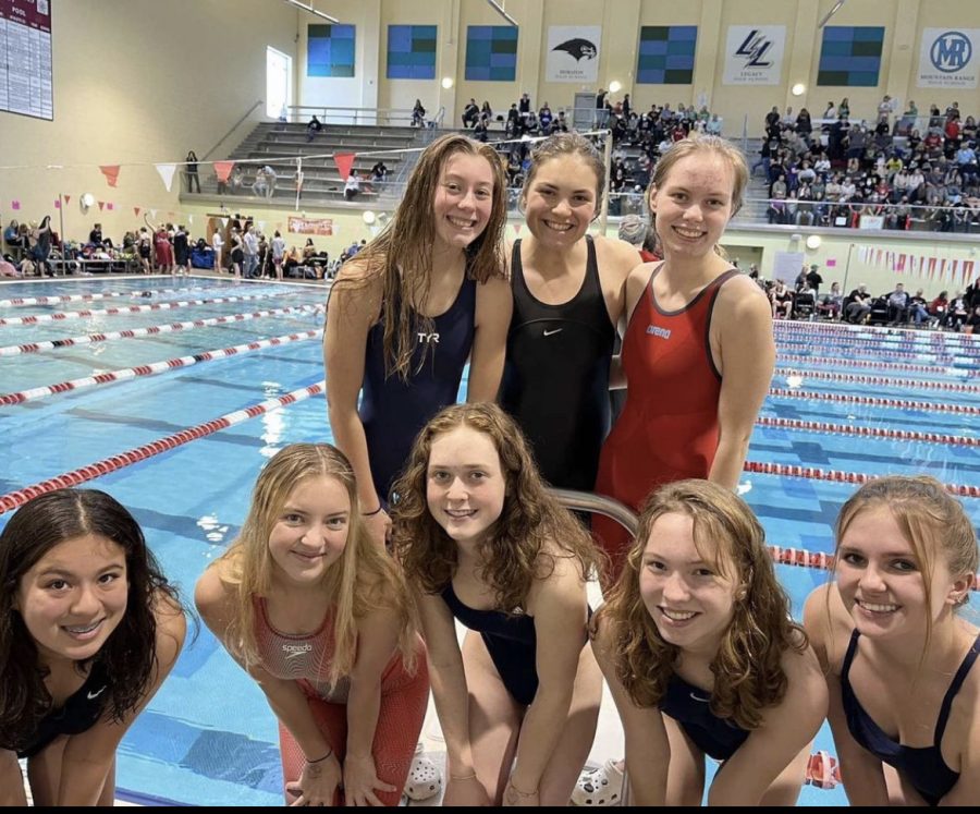 A+few+members+of+Frederick+Highs+Swim+Team+for+the+2021-2022+Season.+There+have+been+many+challenges+faced+throughout+this+years+swim+season%2C+but+that+hasnt+stopped+this+team+from+finding+success.+The+toughest+thing+about+swimming+is+remembering+that+you+can+always+improve+and+that+just+because+you+make+a+mistake+doesn%E2%80%99t+mean+that+mistake+makes+you%2C+says+Paige+Wilcox%2C+a+junior+at+Frederick+High.+I+think+the+highlight+of+the+season+was+when+we+did+our+first+duel+and+won%2C+especially+when+Coach+Mares+had+given+us+a+pep+talk+previous+to+our+meet.