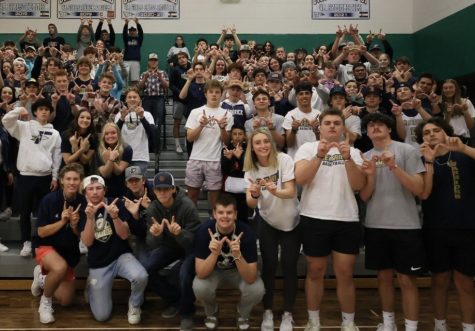 The Rowdy Crowd putting up a dub before the Frederick High Boys Basketball team plays Mead in a previous game at Niwot High. 