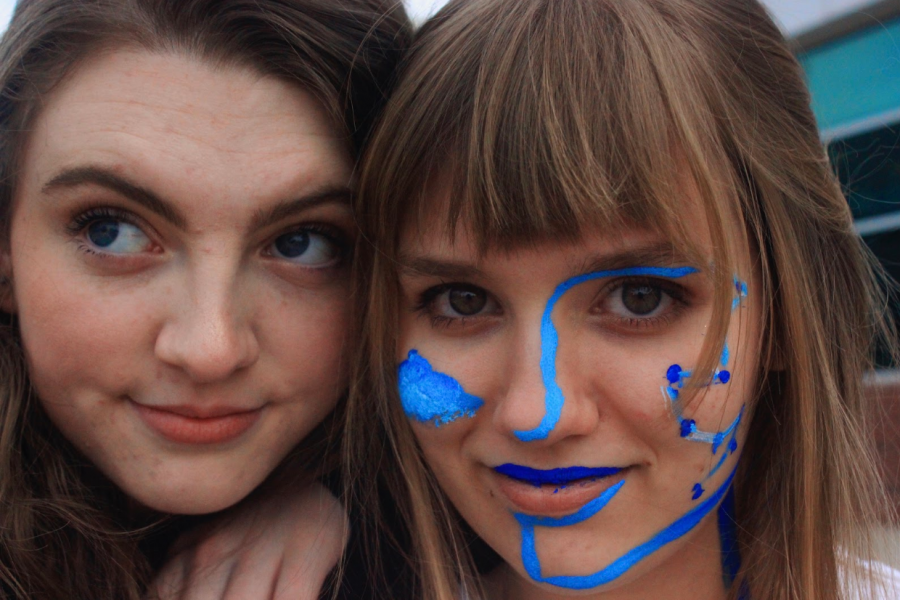 Pictured is seniors Ella Berrend and Mia Palmer pose in a vouge style look for the senior superlative of “Most Creative Imagination.” The two share the title, and deservedly so as the photo helps to convey their creative styles as portrayed with the medium paint on Mia’s face. 