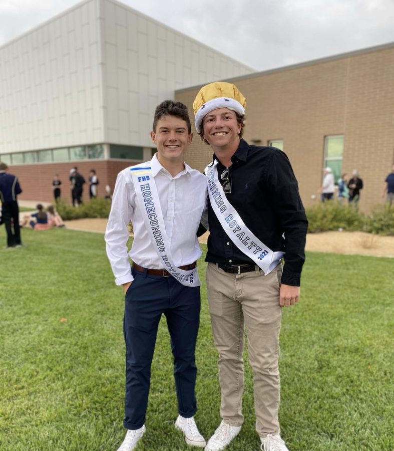 Homecoming King Jake Chestler posing with his fellow nominee Quinn McNeill before the homecoming game.