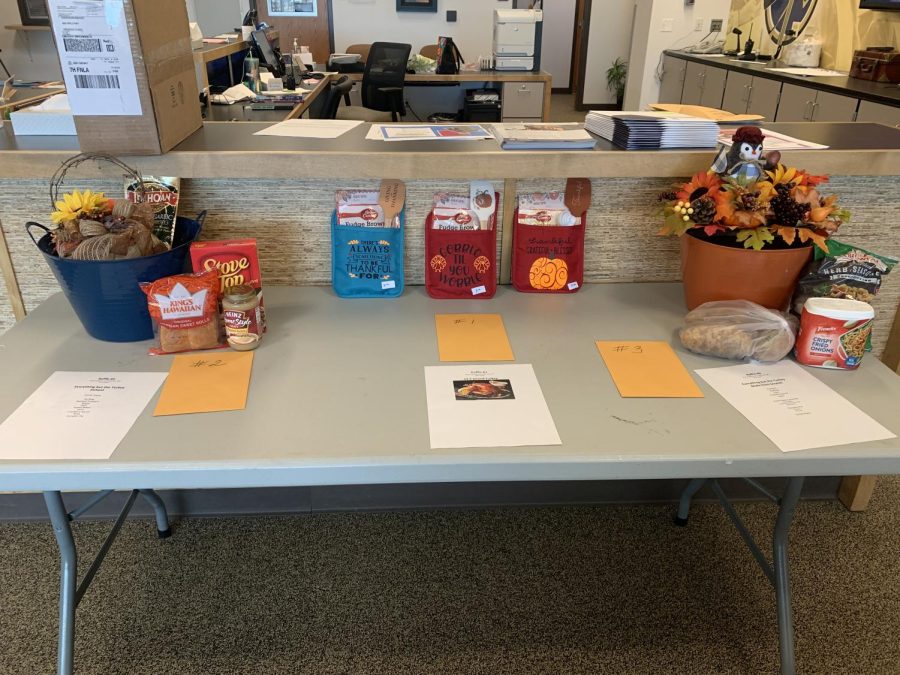 The front office set up for a Thanksgiving raffle for the needy, one of the many community outreach projects Frederick High has planned for this holiday season. This year, Fredericks biggest seasonal project is the Adopt a Family project through advisory. 