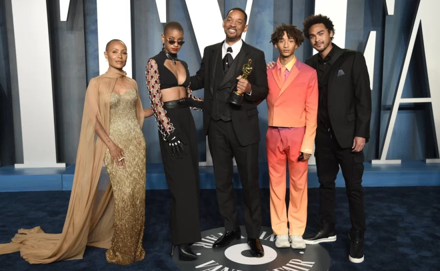 Will Smith (center) poses with his wife Jada (far left), daughter Willow (left), and sons Jaden (right) and Trey (far right) after his Oscar win and controversial assault. His family supported Smith in the immediate aftermath of the Oscars scandal, with Jaden posting And Thats How We Do It on Twitter. However, the backlash has been even greater, with celebrities from OJ Simpson to Mark Hamill condemning Smith. Comedian Jim Carey is even planning to file a $200,000 lawsuit against Smith for his behavior.