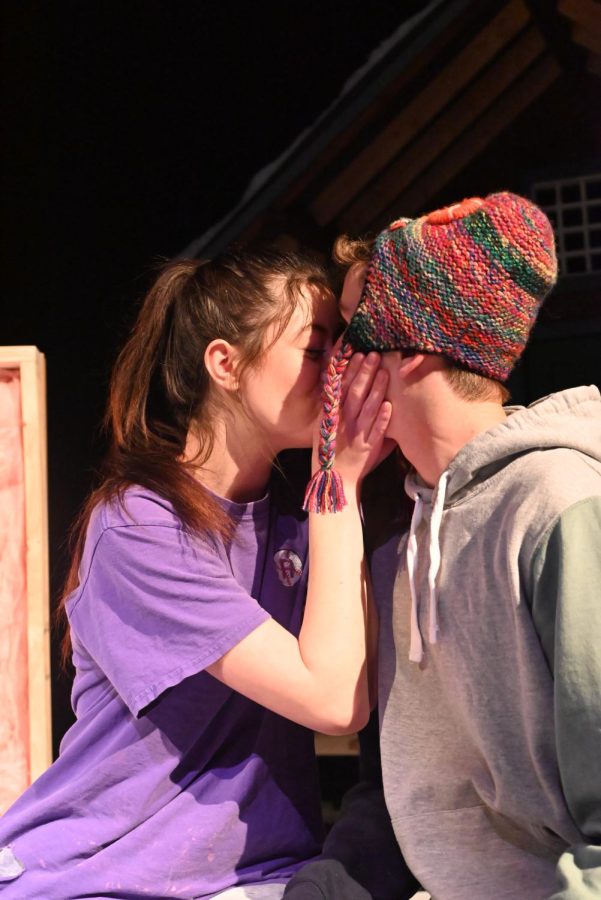 Senior Kaydence Young kisses sophomore Lucas Howell in Almost, Maine. While the two appear to be kissing, this was not an actual kiss, often called a mock. Kaydence cups Lucass face in a way that both looks affectionate yet hides the fact that their lips arent touching.