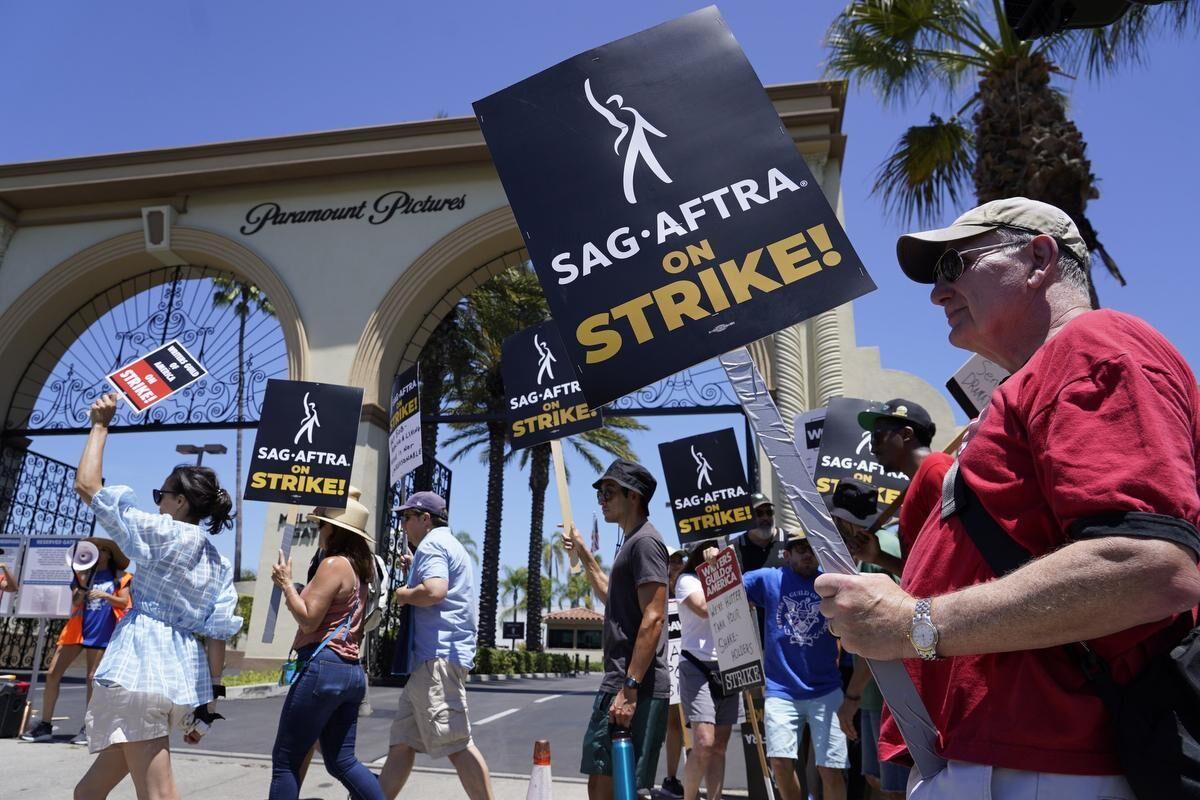 Striking writers and actors outside Paramount studios in Los Angeles in July.