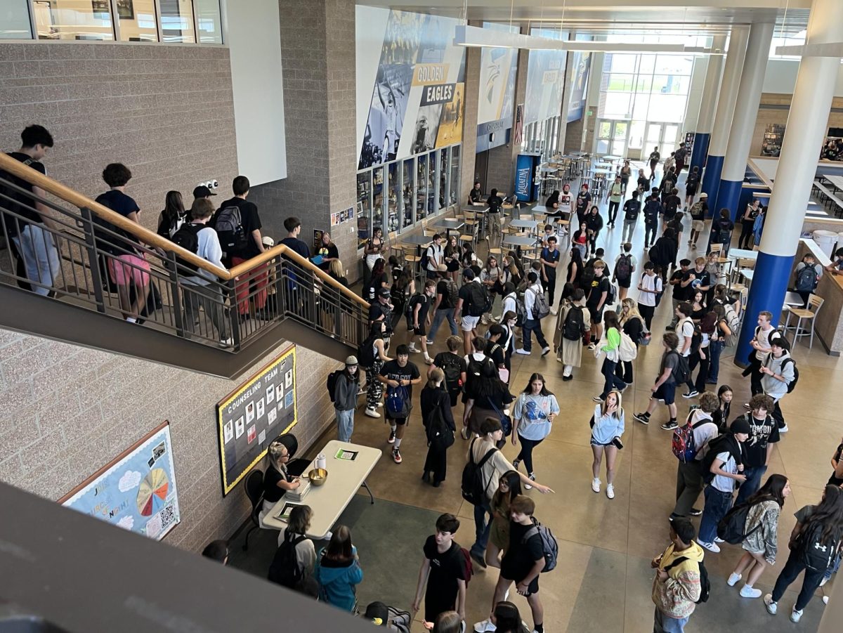 Frederick High School’s stairs into the commons at the start of lunch. Within less than a minute, students begin flooding in and lining up to get food.