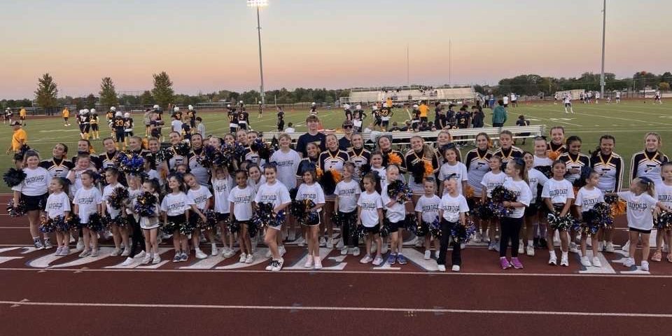 Varsity cheer had a blast teaching kids how to cheer at the football game. Unforgettable memories were made for the children and the cheer team. 