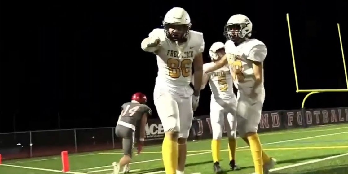 A Golden Eagle player points at the camera after scoring the third unanswered touchdown against the Loveland Red Wolves. Despite being at Loveland High, Frederick dominated the field the entire game. (Courtesy of Loveland High School)