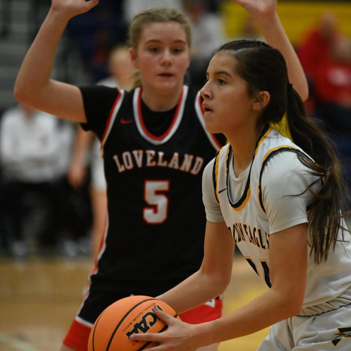 Looking for the perfect pass, Rylee Gallegos looks for a way out of a sticky situation. All throughout the night, Loveland’s defense was strong, but Frederick was able to fight past it to put points on the board. 