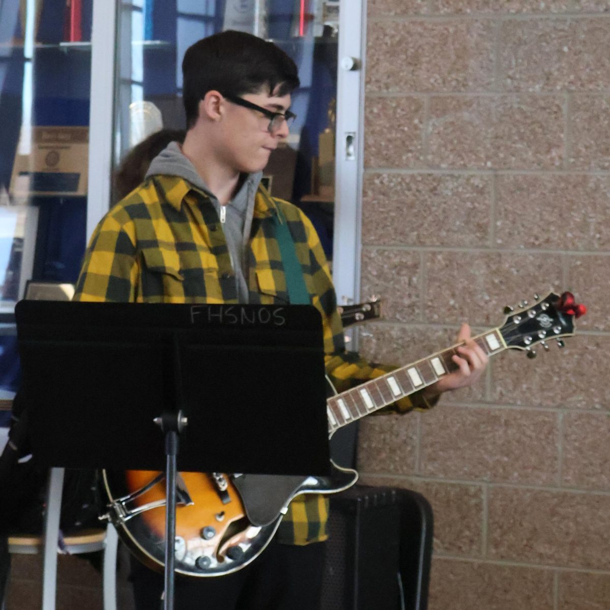 Frederick High Schools school of rock class gave a performance for students at lunch on Tuesday. They covered songs by artists like Artic Monkeys, Billy Idol and Alice In Chains.