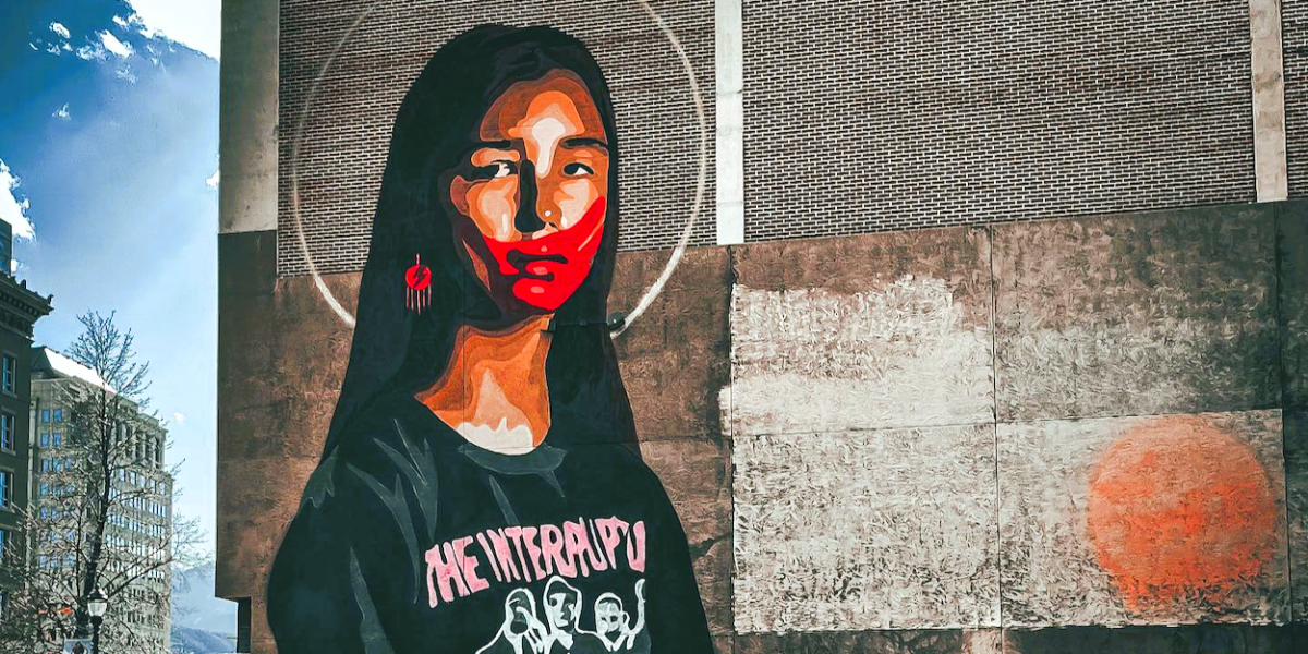 A mural of 14-year-old Native American woman Sage Deal towers over the corner of Tejon St. and Pikes Peak Ave. in Downtown Colorado Springs. This 77-foot mural, called "Take Back the Power," was painted by Deal's father Gregg to bring awareness to the plight of missing and murdered Indigenous women across the US. The red handprint over the mouth is a national symbol that these victims are being silenced and that those who keep their victimization quiet have blood on their hands. (Courtesy of Raven Payment)