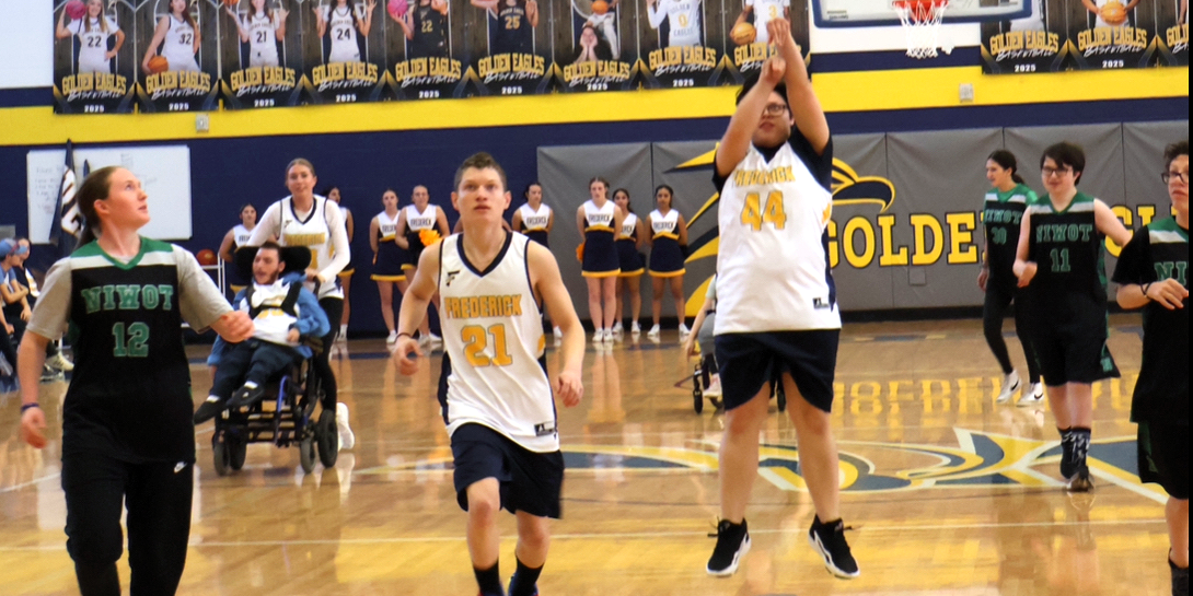 Number 44 Marissa Blea shoots a basket during the second quarter of Frederick High's Unified Basketball game against Niwot on January 28. Frederick won against the Cougars to sustain a three-game winning streak, which includes a tournament appearence where the Golden Eagles netted second place. 