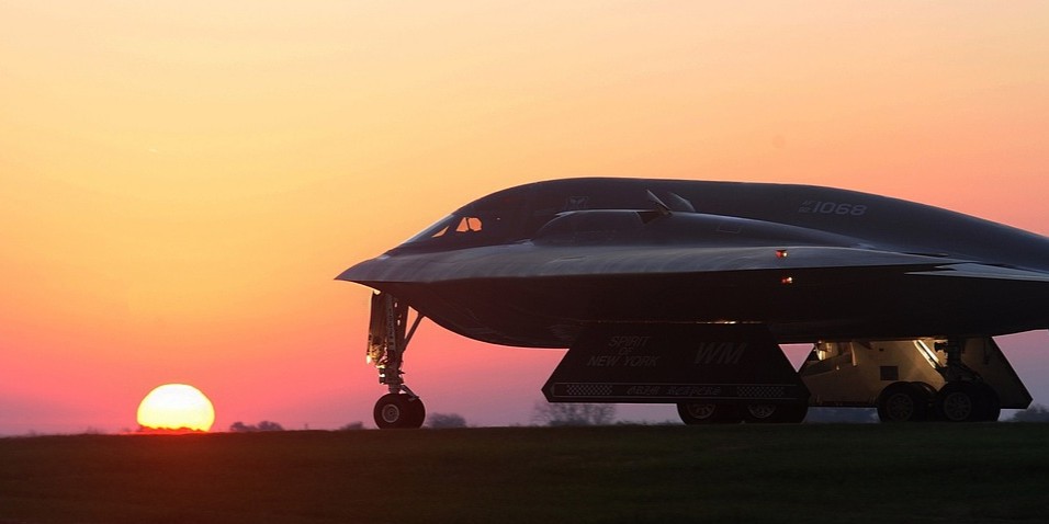A B-2 Spirit bomber taxis on a flight line as the sun rises in October 2014. A similar site could be witnessed at Al Udeid Air Base in Qatar on June 22, 2025 after seven bombers (along with over 100 additional supporting aircraft) returned from Operation Midnight Hammer, which bombed three underground nuclear sites in Iran. The strike intended to destroy Iran's nuclear development program and came after a week of armed conflict between Israel and Iran. (Airman 1st Class Joel Pfiester/US Air Force)