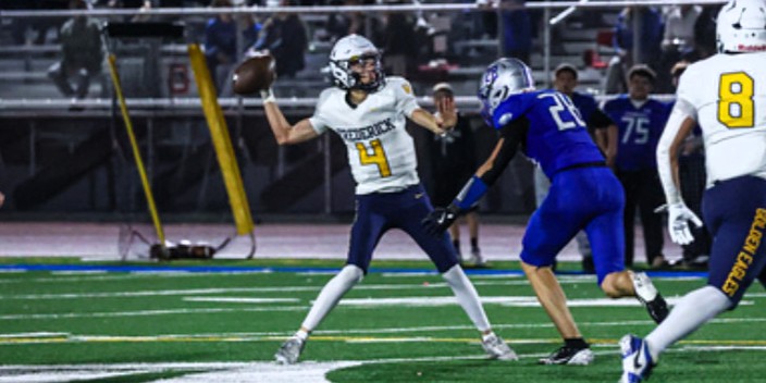 Senior Preston Kissinger, the quarterback for the Golden Eagles, played well throughout high school and helped make the football team feel like a community. He has made unforgettable memories and friends on the field. (Chris Tone)