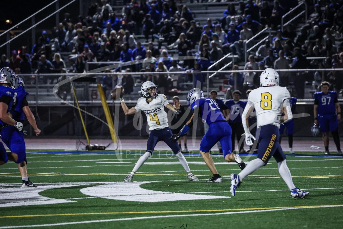 preston kissinger throws completed pass in the 4th quarter of the season opening game against broomfield.