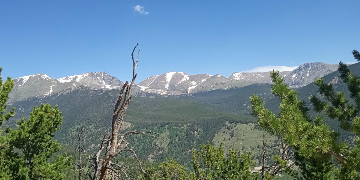 Rocky Mountain National Park, from Trail Ridge Road in June of 2025. Government shut downs have almost happened before this decade, but the government hasn’t actually shut down since 2018. Due to the government shut down, national parks such as Rocky Mountain National Park, have shut down. 