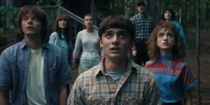 Characters Will, Jonathan, Nancy, Joyce, Eleven, Mike, and Hopper at the end of season four after Vecna destroyed Hawkins. Season four left off on quite the cliffhanger, which has left fans on the edge of their seats waiting for the new season. (Netflix)